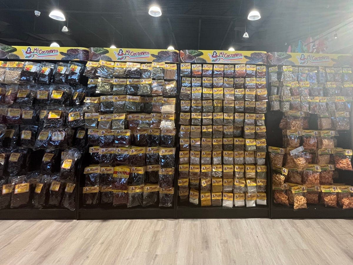 Wall of Mexican dried goods, chiles, and spices at Los Portales