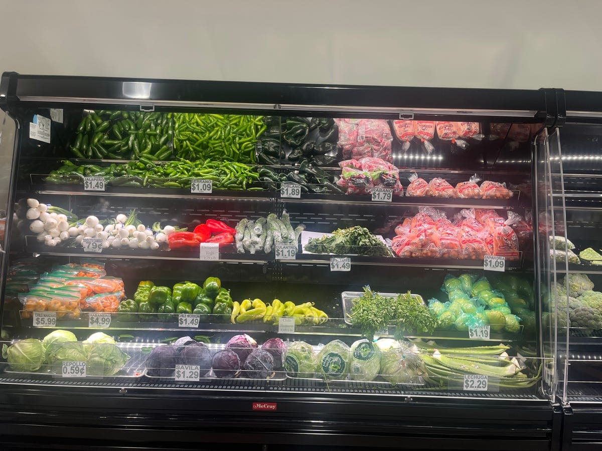 Refrigerated produce: jalapeños, serranos, poblanos, habaneros at Los Portales